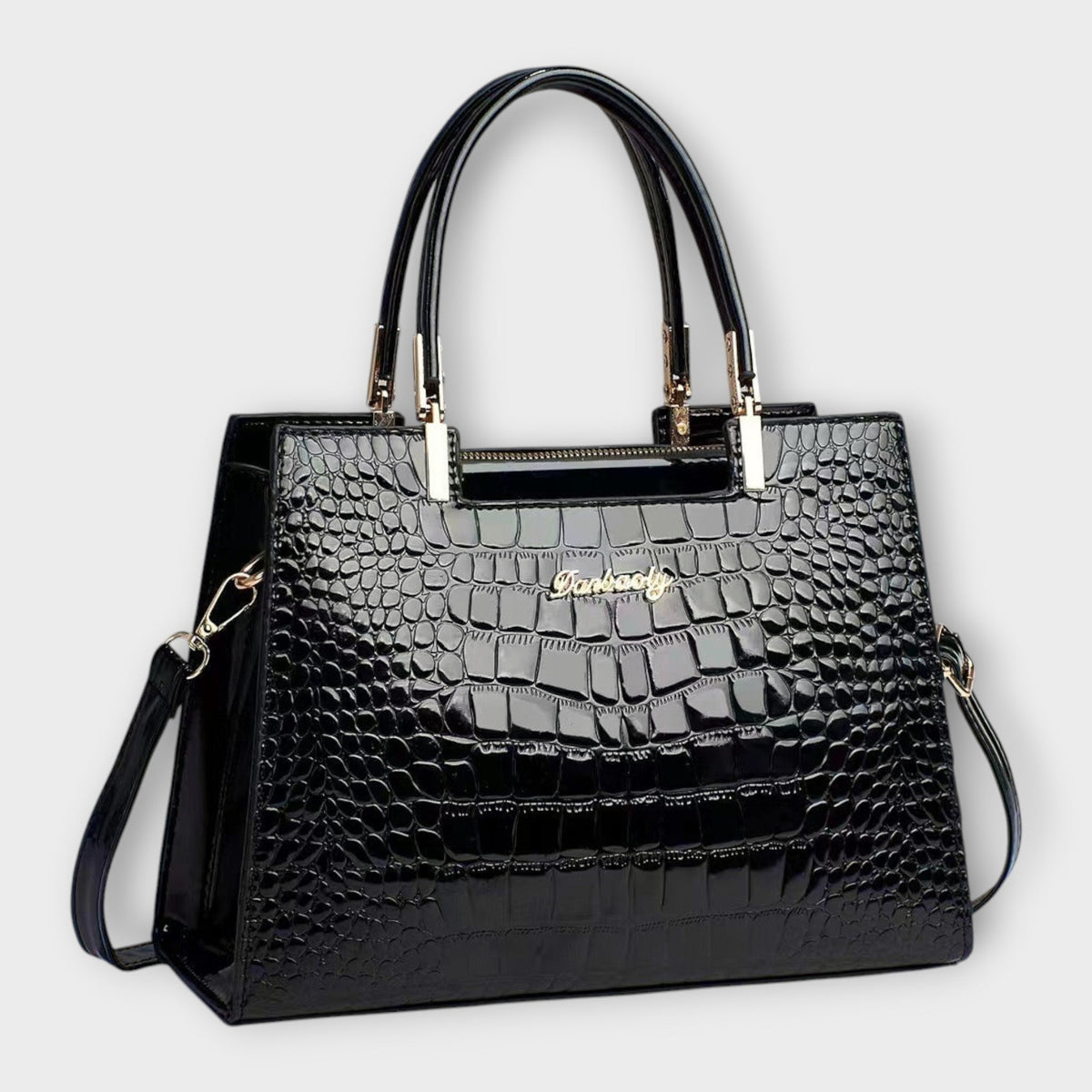 Sac à main en cuir crocodile brillant