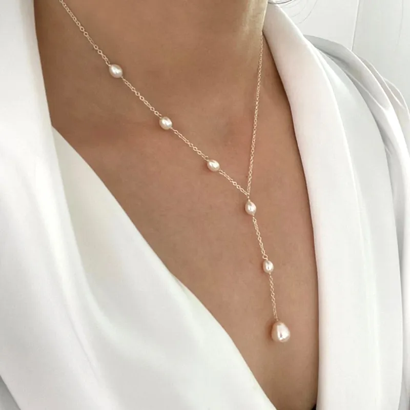 Collier avec pendentifs vintage et perles
