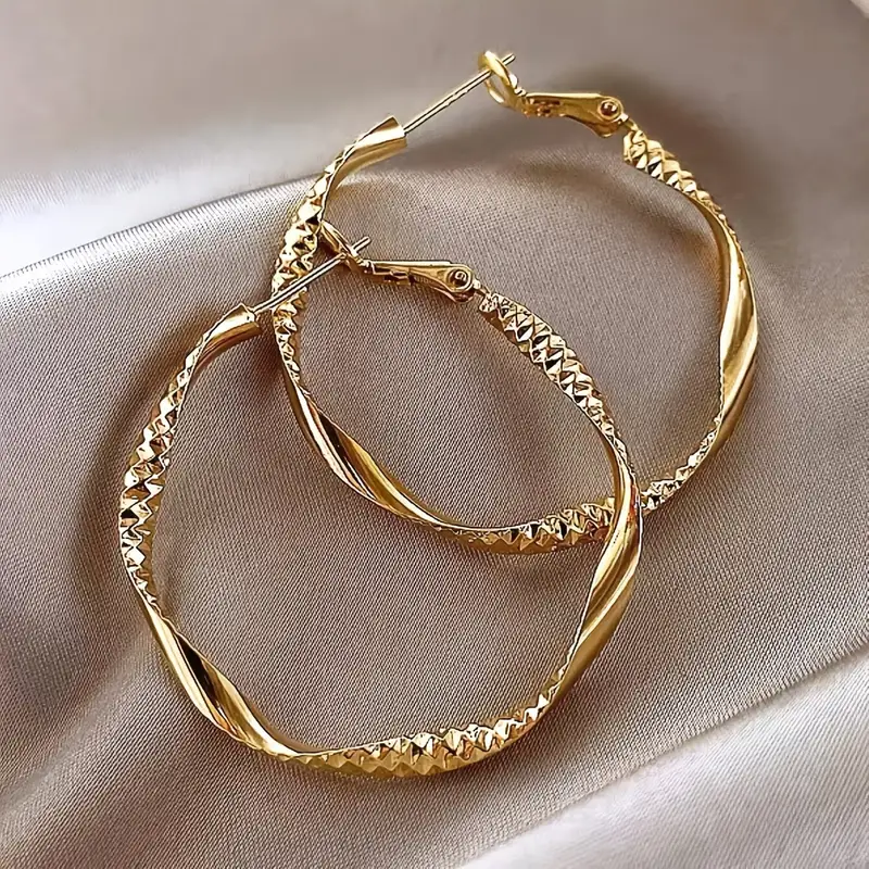 Boucles d'oreilles en or avec cerceau lumineux